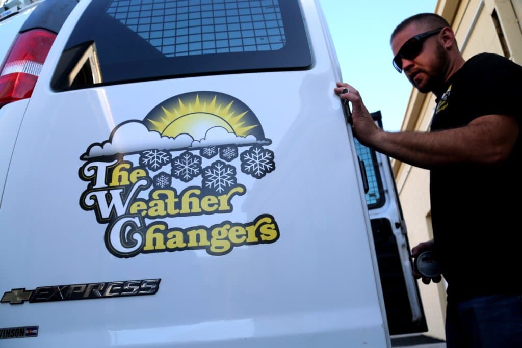 Technician installing new equipment