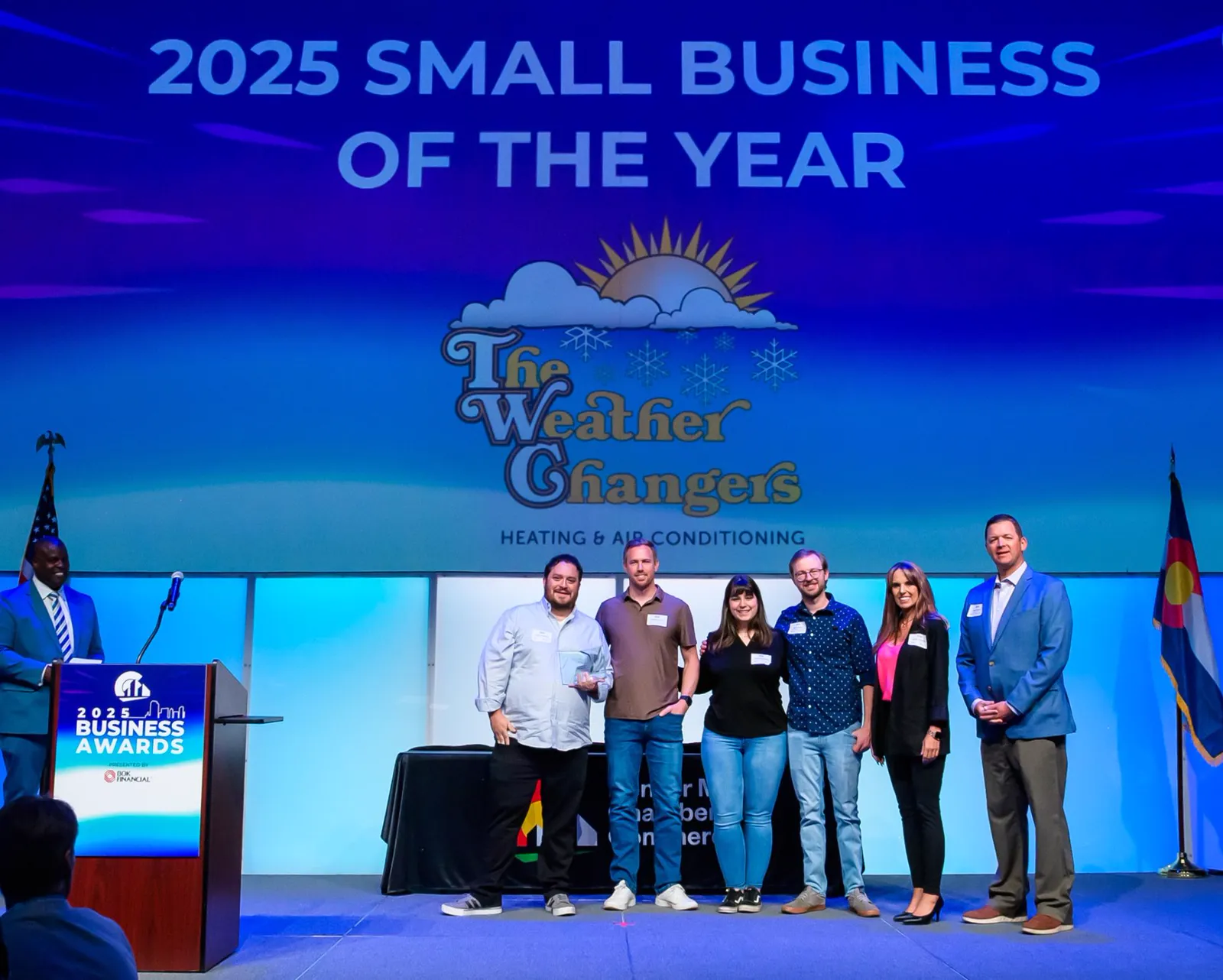 The Weather Changers team with the Small Business of the Year award